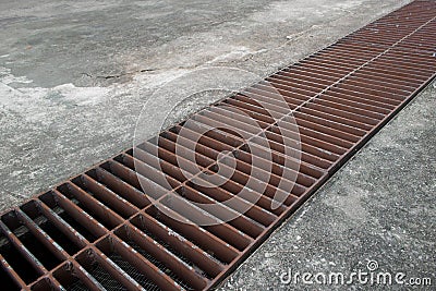 Water drain at the edge of the field Stock Photo