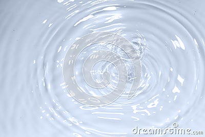 Water drop on clear water wave circle pattern background Stock Photo
