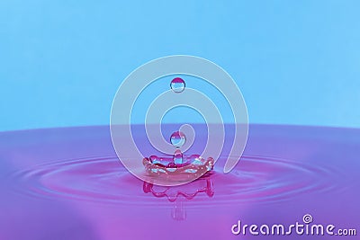 Water Drop Pink Blue Stock Photo