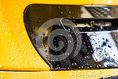 Water drop on yellow background Stock Photo