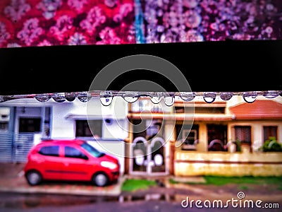 Water droplet with car in background with blur Stock Photo