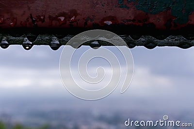 The water droplets on the steel beams formed by a recent rainstorm make crystal clear raindrops on the steel surface look beautifu Stock Photo