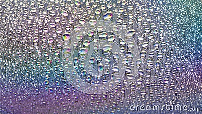 Water drops. Abstract gradient backdrop Colored drop texture. Rainbow gradient. Heavily textured image. Small depth of field. Stock Photo