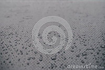 Water drops on car carbon. Dark wallpaper Stock Photo