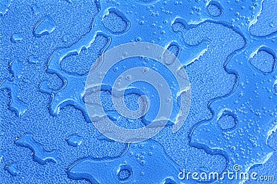 Water drops over blue plastic material Stock Photo