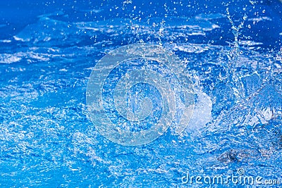 Water drops over swimming pool, blue background with copy space Stock Photo