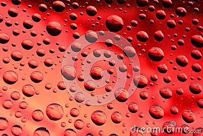 Water drops on red background Stock Photo