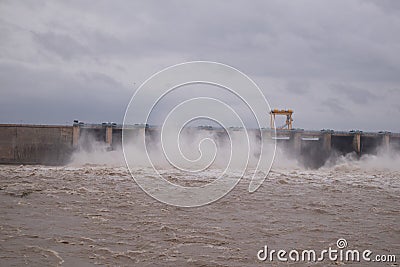 Water filled in Dam due to heavy rain and the gates of the reservoir is opened to release the water from the reservoir or dam. Stock Photo