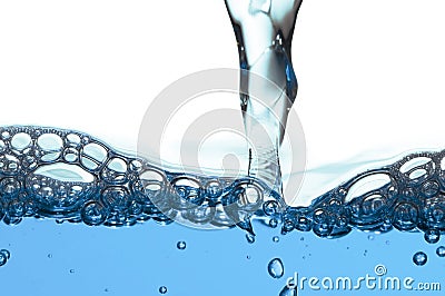 Water flowing with bubbles Stock Photo