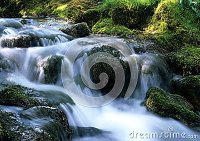 Water Flowing over Rocks. Stock Photo