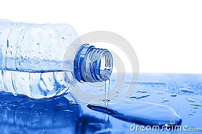 Water flows from a bottle Stock Photo