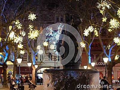 Water fountain and Christmas lights at Sloan Square, London, UK Editorial Stock Photo