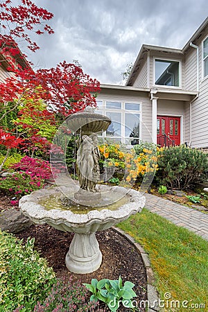 Water Fountain on Frontyard of Home Stock Photo