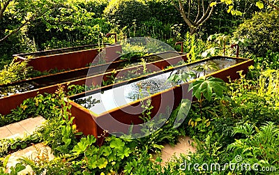 Water in the garden at Chelsea Flower Show in London Editorial Stock Photo