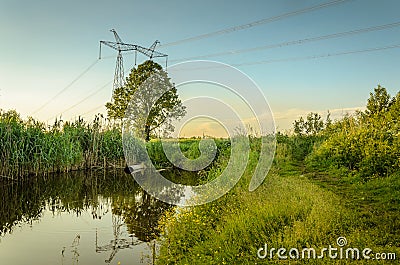 Water gushing from the sewer to river/ecology concept: sewer pours out waste to the river Stock Photo