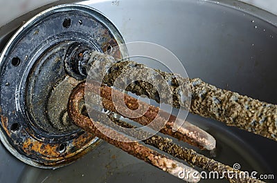 Water heater flange with anode, temperature sensor and electric heating element Stock Photo