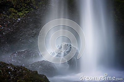 Water hits boulders at base of Waterfalls Stock Photo