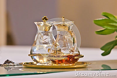 Water and wine on the altar ready for mass Stock Photo