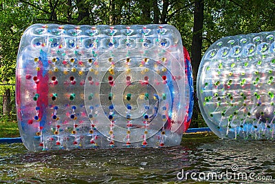 Water inflatable attraction in the park Stock Photo