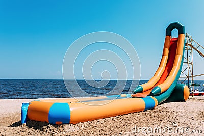 Water inflatable slide attraction. recreation concept on the water Stock Photo