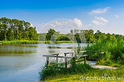 Water lake with jetty and beautiful nature scenery, the melanen, Halsteren, Bergen op zoom, The Netherlands Stock Photo