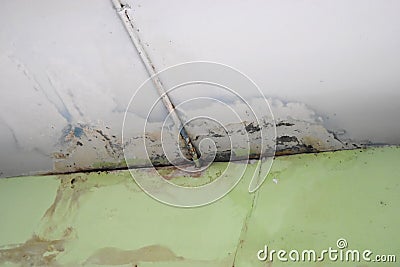 Water leaks on the ceiling causing damage. Stock Photo