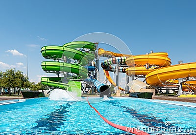 Water park with colorful slides and pools Stock Photo