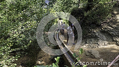 Water pipe dug into the rock Editorial Stock Photo