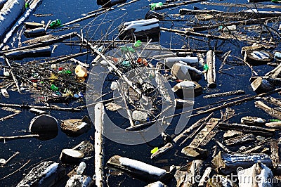 Water pollution in a lake with garbage Stock Photo