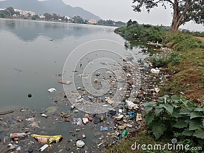 water pollution - plastic pollution in pond Editorial Stock Photo