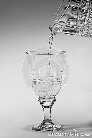 Water poured into a glass Stock Photo