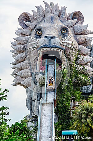 Water rafting machine running out from the mouth of giant lion sculpture at Siam Park City, is a world-class amusement. Editorial Stock Photo