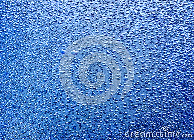 Water raindrops nano effect on a blue background Stock Photo