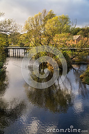 Water reflections on the river Esk at Ruswarp, North Yorkshire Stock Photo