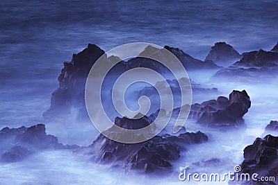 Water with rock nature photo with long exposure fog effect abstract color ocean background Stock Photo