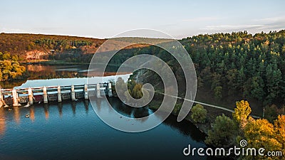 Water rushing through gates at a dam Stock Photo