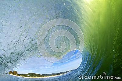 Water shot of a barreling wave breaking in the morning at Campeche beach in FLorianÃ³polis Brazil Stock Photo