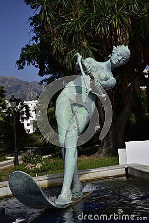 Water Skier Statue on the Beach in Marbella Spain Editorial Stock Photo