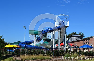 Water slides at a community waterpark. Stock Photo