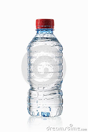 Water. Small plastic water bottle with water drops on white back Stock Photo