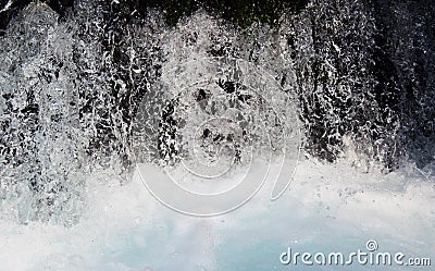 Water small waterfall with white foam Stock Photo