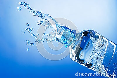 Water splash from bottle Stock Photo