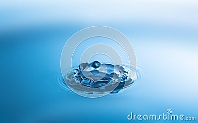 Water splash close-up. Crown of blue water. Water drop. Aqua background Stock Photo