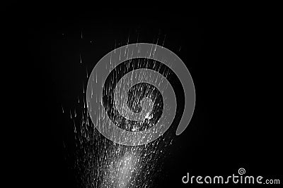 Water splash, spray jet and steam from steam generator isolated on black background. Perfect design element Stock Photo