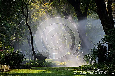 Water sprau amd light in public park Stock Photo