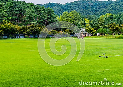 Water sprinkler in field Editorial Stock Photo