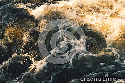Water stream with foam. falling river water. waterfall flow. abstract water background Stock Photo