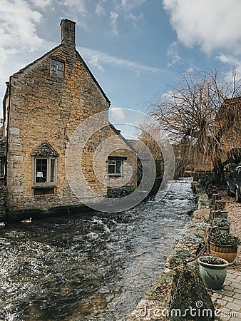 Water stream next to Halt Motoring Museum located in the picturesque village of Bourton on the Water Stock Photo
