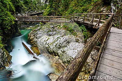 Water stream and wooden path in Vintgar gorge, Bled, Slovenia Stock Photo