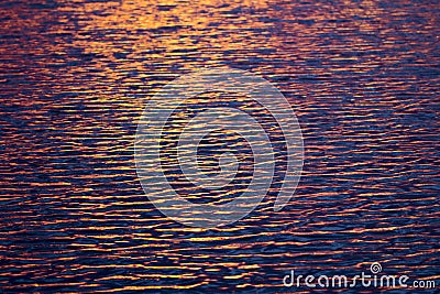 The water surface at the lake with light of sunset Stock Photo